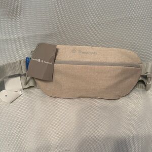 Therabody Beige‎ Crossbody Bag